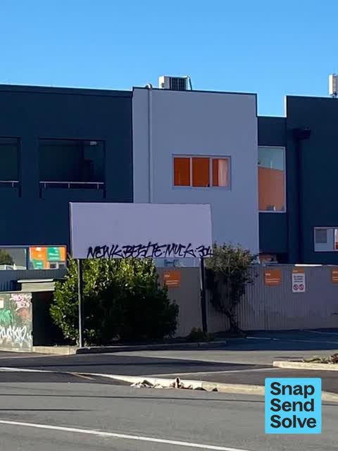 Graffiti on a fence, building or structure, a report photo