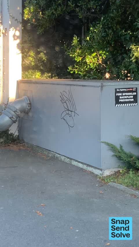 Graffiti on a fence, building or structure — a report photo