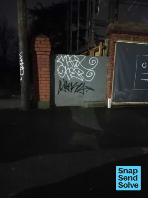 Graffiti on a fence, building or structure — a report photo