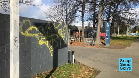 Graffiti on a fence, building or structure, a report photo