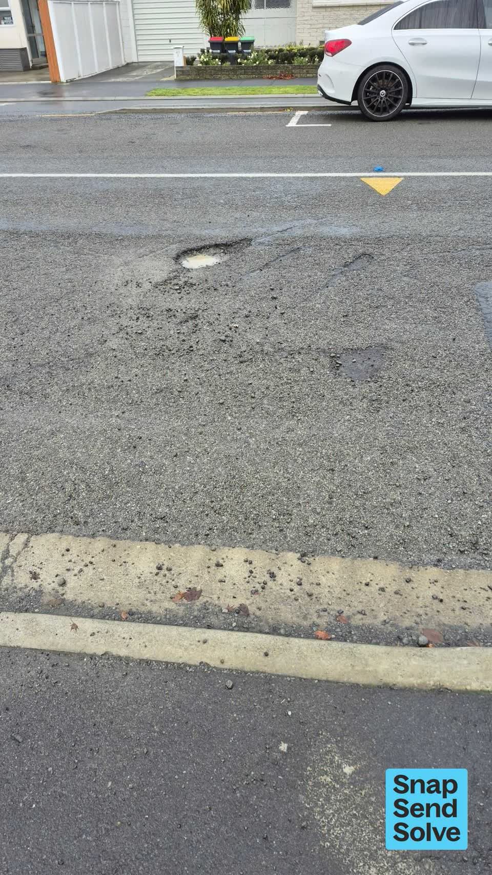 The photograph attached to this pothole report