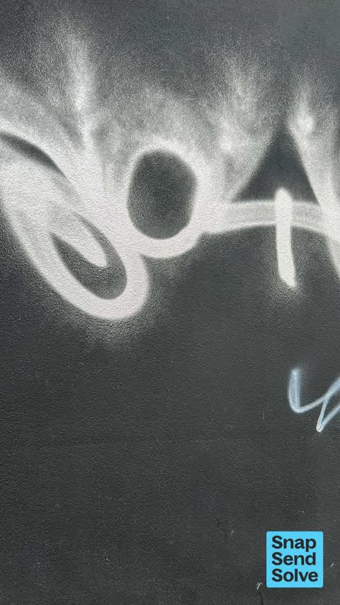 Graffiti on a fence, building or structure, a report photo