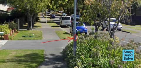 Graffiti on a traffic light pole or cabinet, or wa — a report photo