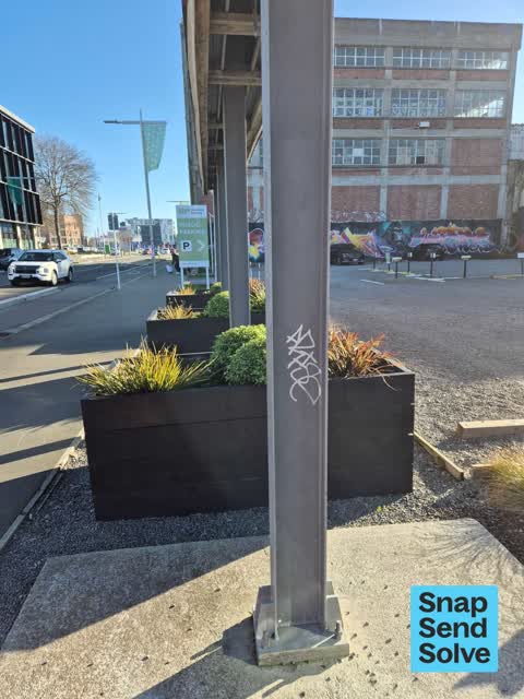 Graffiti on a sign, mural or public art, a report photo