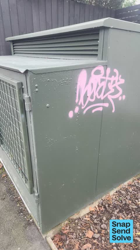 Graffiti on a fence, building or structure — a report photo