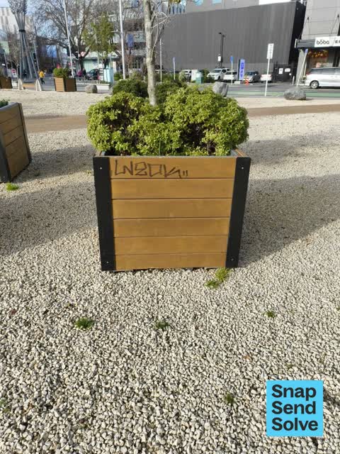 Graffiti on a fence, building or structure, a report photo