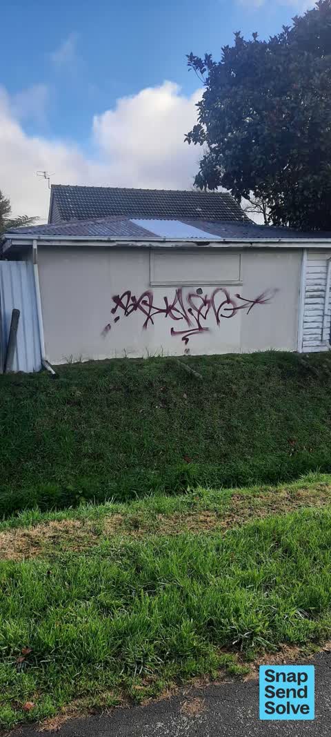 Graffiti on a fence, building or structure, a report photo