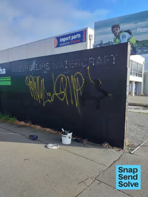 Graffiti on a fence, building or structure, a report photo