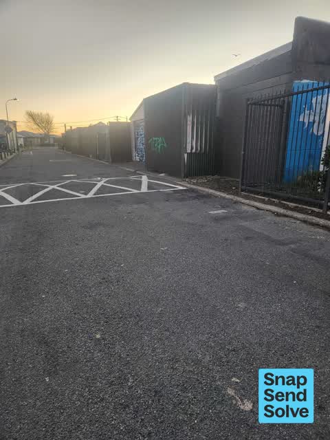 Graffiti on a fence, building or structure, a report photo