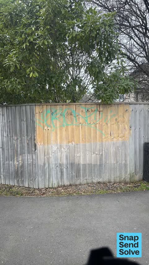 Graffiti on a fence, building or structure, a report photo