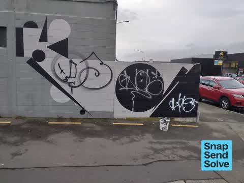 Graffiti on a fence, building or structure — a report photo
