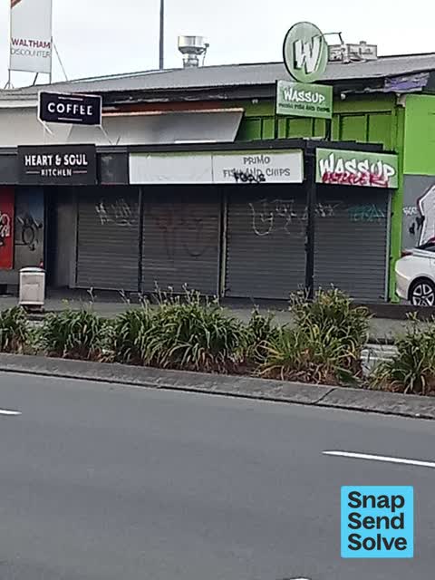 Graffiti on a fence, building or structure, a report photo