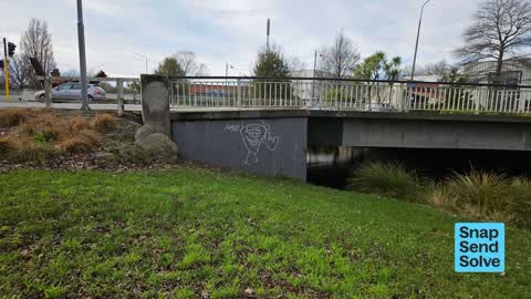 Graffiti on a fence, building or structure — a report photo