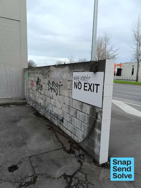 Graffiti on a fence, building or structure — a report photo