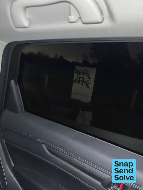 Graffiti on a fence, building or structure, a report photo