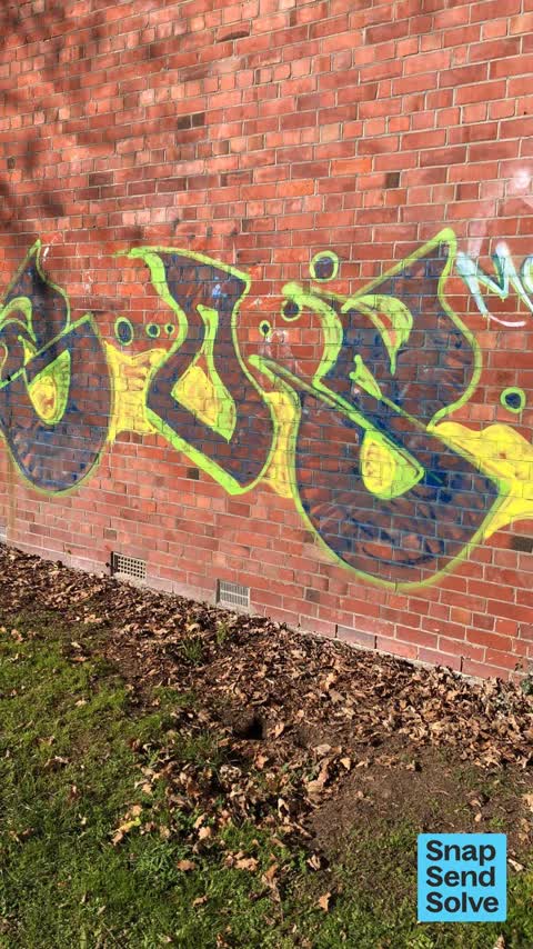 Graffiti on a fence, building or structure — a report photo