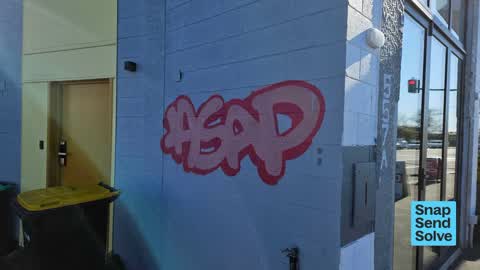 Graffiti on a fence, building or structure, a report photo