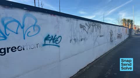 Graffiti on a fence, building or structure — a report photo