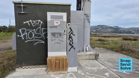 Graffiti on a fence, building or structure — a report photo