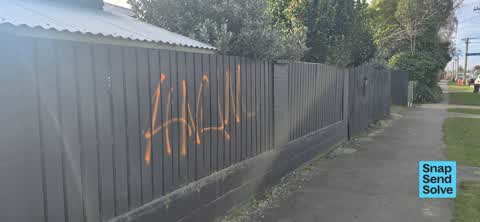Graffiti on a fence, building or structure, a report photo