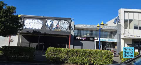 Graffiti on a fence, building or structure — a report photo