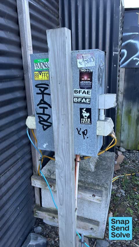 Graffiti on a fence, building or structure, a report photo