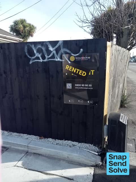 Graffiti on a fence, building or structure, a report photo