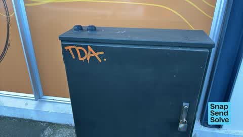 Graffiti on a fence, building or structure, a report photo