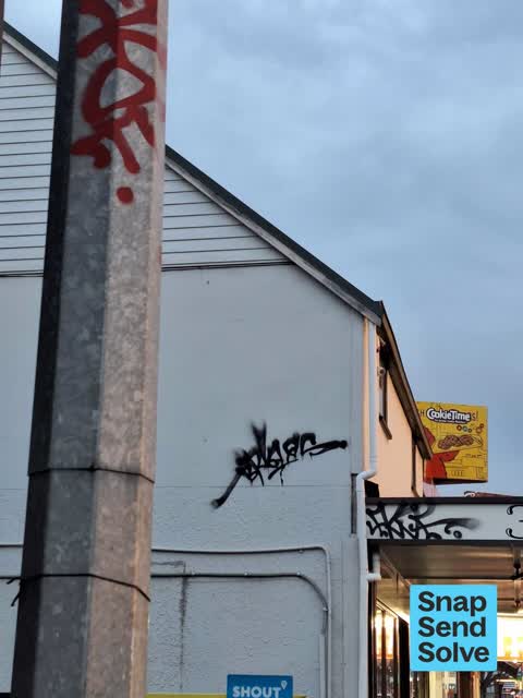 Graffiti on a fence, building or structure — a report photo