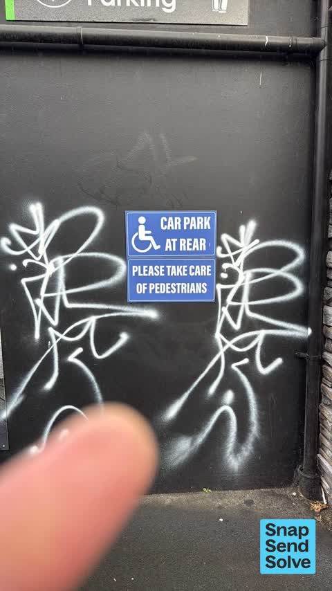 Graffiti on a fence, building or structure, a report photo