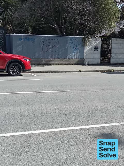 Graffiti on a fence, building or structure, a report photo