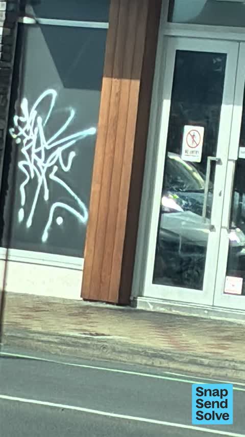 Graffiti on a fence, building or structure — a report photo