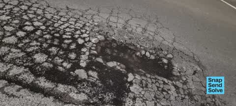 Pothole, a report photo