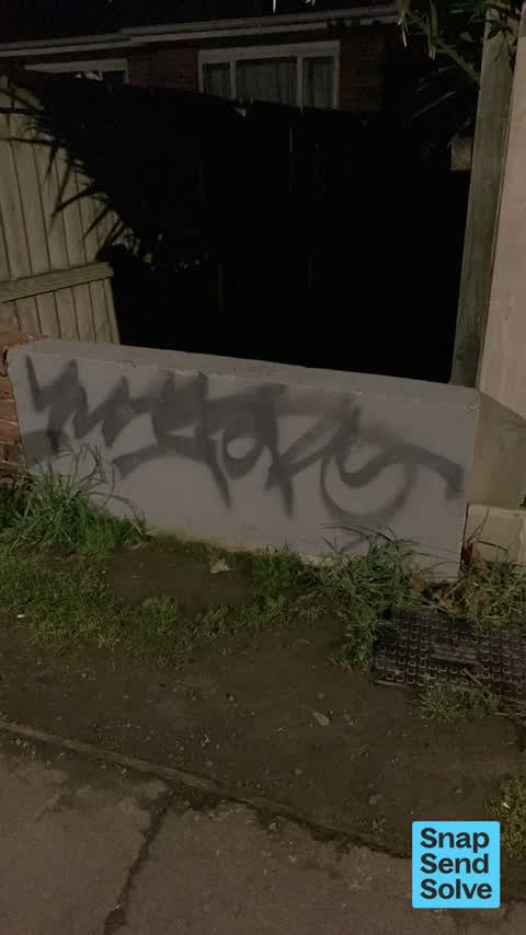 Graffiti on a fence, building or structure, a report photo
