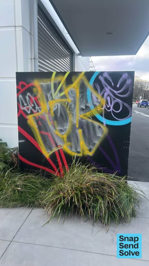 Graffiti on a fence, building or structure, a report photo