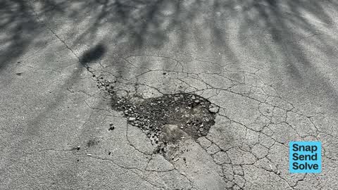 Pothole, a report photo
