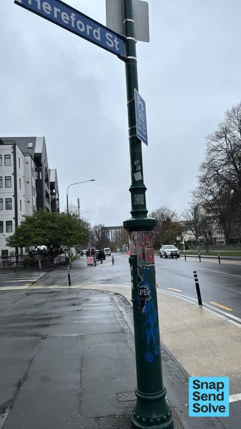 Graffiti on a traffic light pole or cabinet, or wa, a report photo