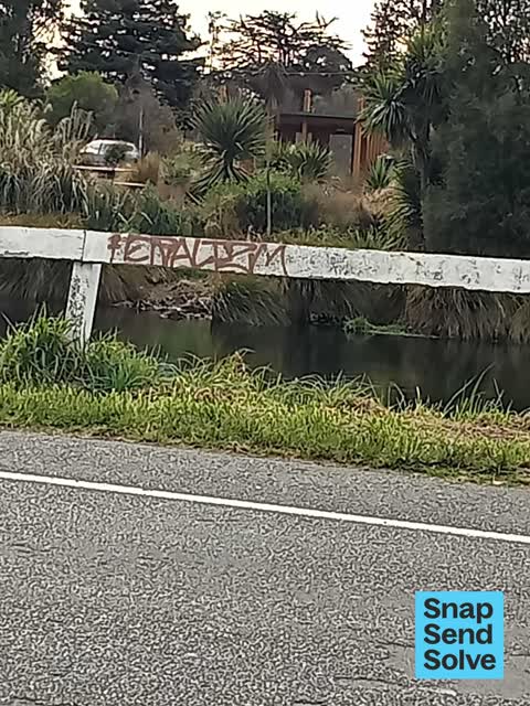 Graffiti on a fence, building or structure, a report photo
