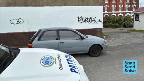 Graffiti on a fence, building or structure, a report photo
