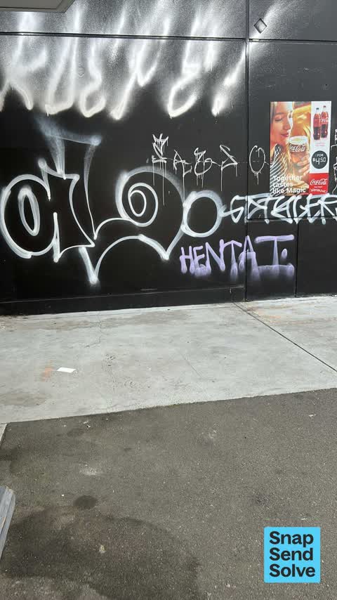Graffiti on a fence, building or structure, a report photo