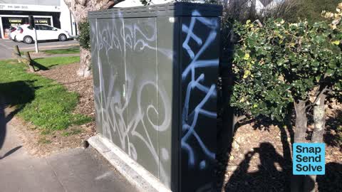 Graffiti on a fence, building or structure — a report photo