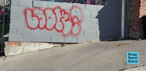 Graffiti on a fence, building or structure, a report photo