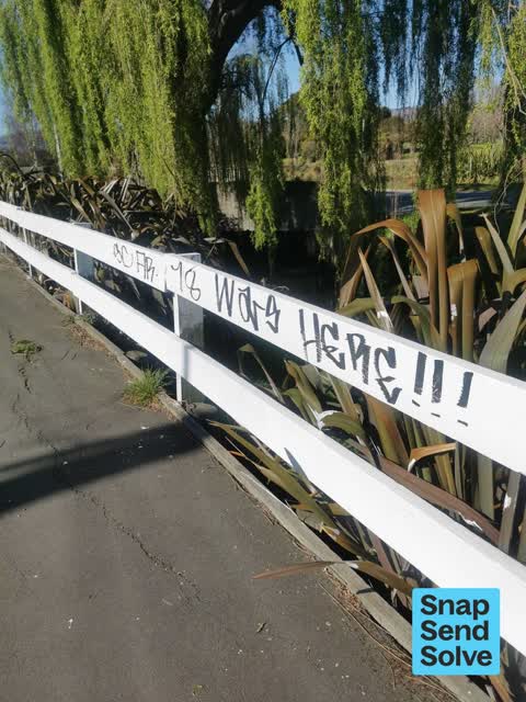 Graffiti on a fence, building or structure, a report photo