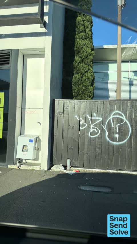 Graffiti on a fence, building or structure — a report photo