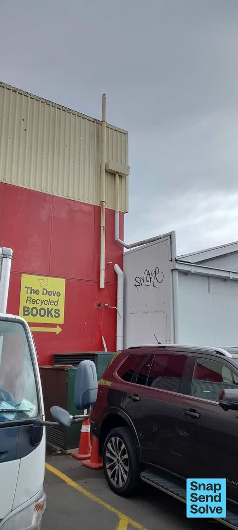 Graffiti on a fence, building or structure — a report photo