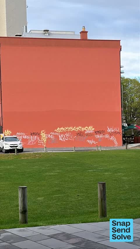 Graffiti on a fence, building or structure, a report photo