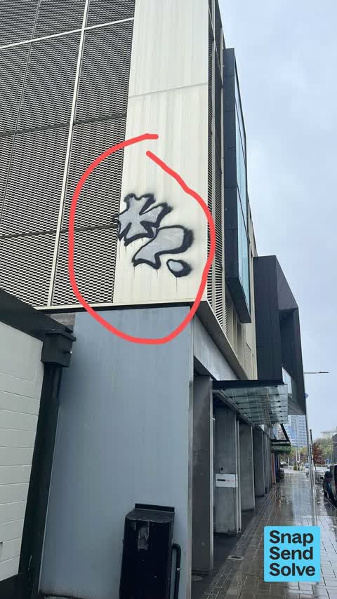 Graffiti on a fence, building or structure, a report photo