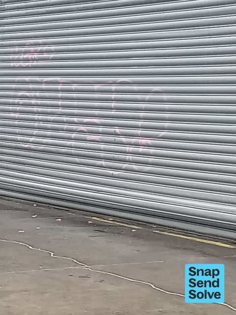 Graffiti on a fence, building or structure, a report photo
