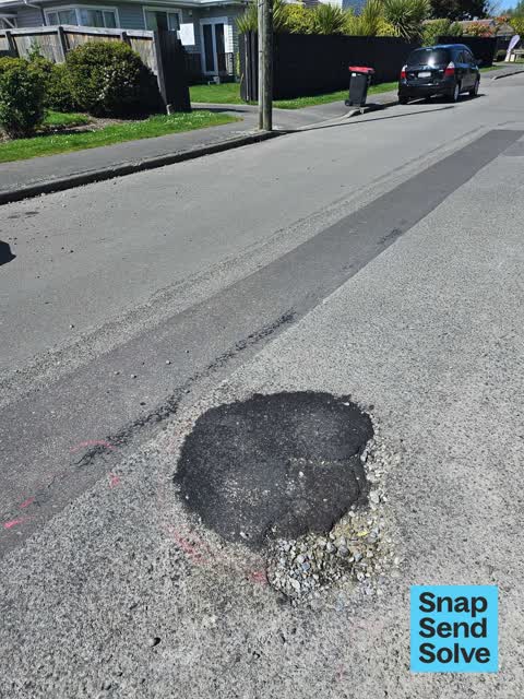 Pothole, a report photo