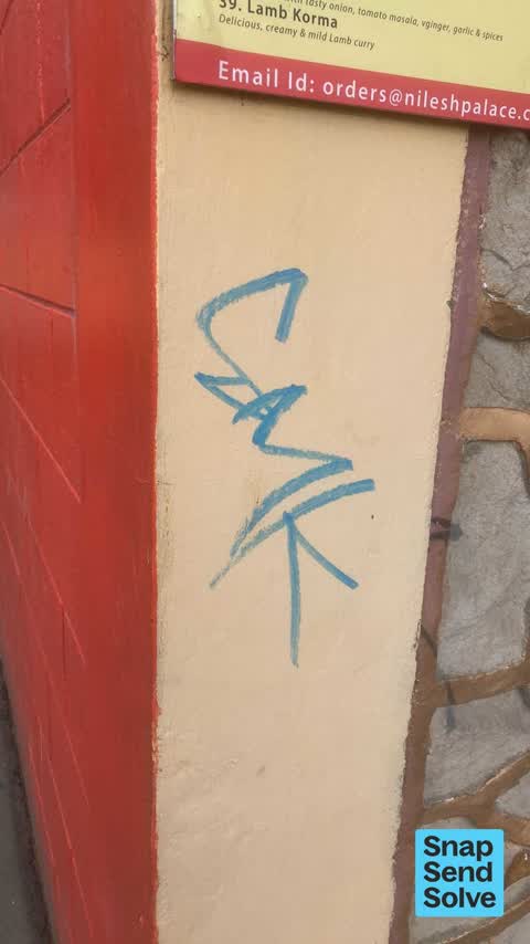 Graffiti on a fence, building or structure, a report photo